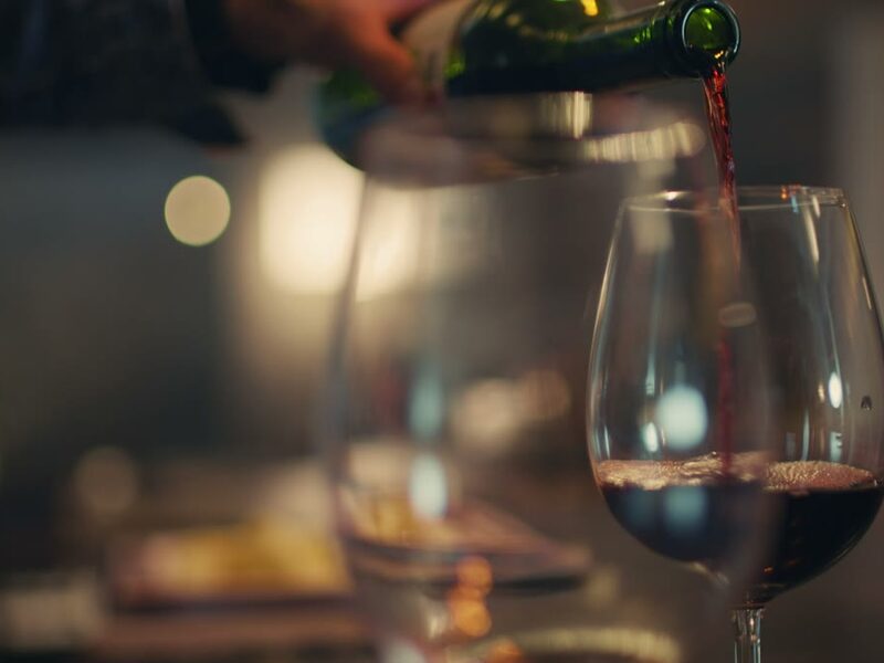 Red wine being poured