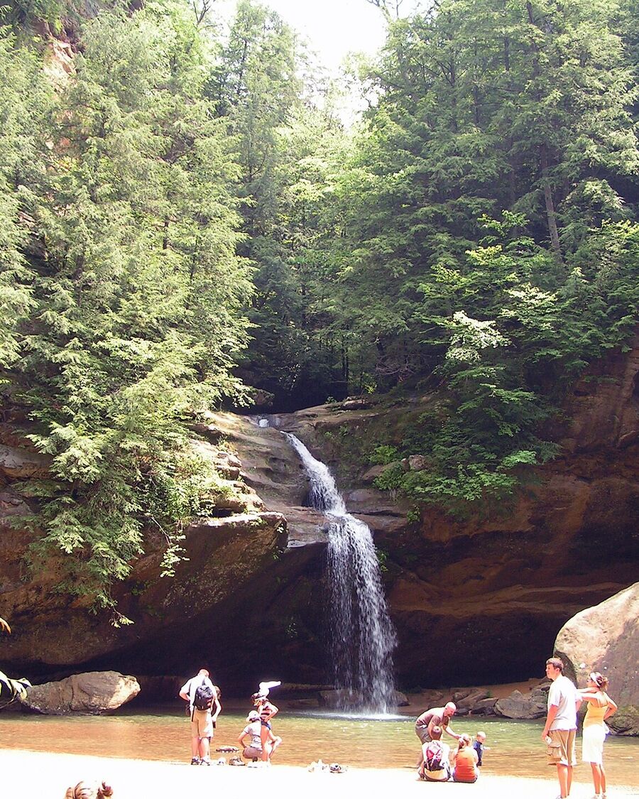 Families in the pool below the lower falls at Old Man's Cave